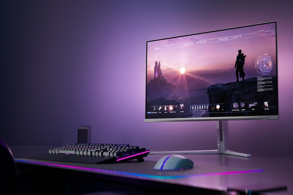 Vista posterior y frontal de la pantalla de juegos premium mostrando la iluminación ambiental inteligente de el nuevo monitor QD-OLED de Philips.