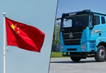 El auge disruptivo del camión eléctrico: China lidera la descarbonización pesada Flota de camión eléctrico de alta tecnología operando en un corredor logístico verde en 2026.