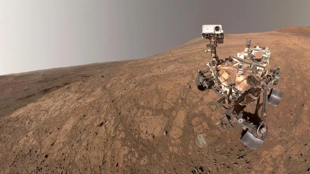 El rover Perseverance explorando rocas ígneas en el borde del cráter Jezero en Marte