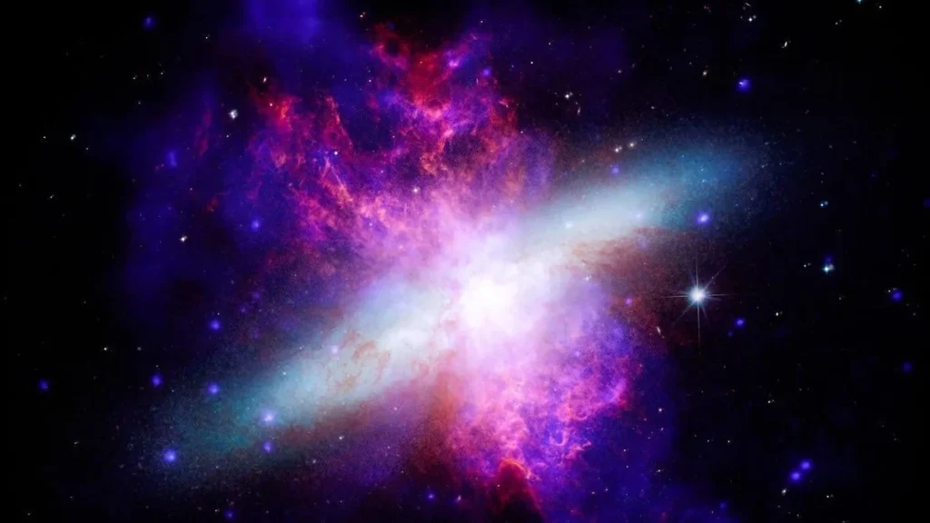 Imagen astronómica combinada en rayos X e infrarrojos de la galaxia Messier 82.